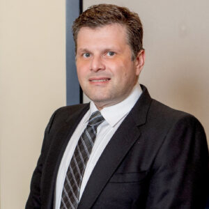 Mark E. Solomon